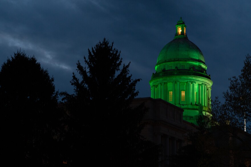 The Kentucky State Capitol on 4/9/20, lit up green in memory of those who died from COVID-19.