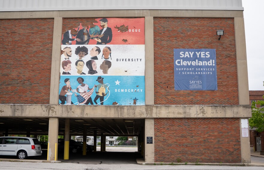 A faded mural on the side of Collinwood High School on Cleveland's Northeast Side.