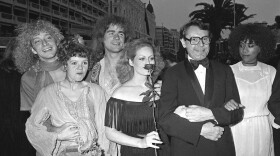 FILE - U.S. actors, from left, Don Dacus, Annie Golden, Treat Williams, Beverly d'Angelo, director Milos Forman, and Cheryl Barnes arrive for the presentation of "Hair" during the 32nd Cannes Film Festival in Cannes, France May 10, 1979. Williams, whose nearly 50-year career included starring roles in the TV series “Everwood” and the movie “Hair,” died Monday, June 12, 2023, after a motorcycle crash in Vermont, state police said. He was 71.
