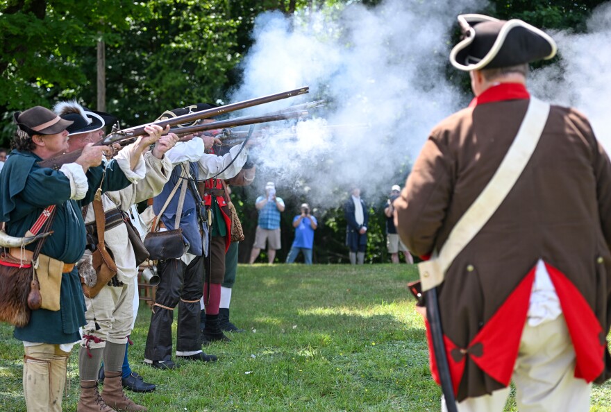 Members of the 24th Connecticut Militia Regiment reenactors perform a volley tribute during the annual commemorative service of the battle and massacre of Wyoming.