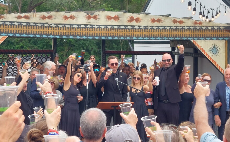 Family and friends toast to the memory of Tommy York at a memorial on September 13, 2026.