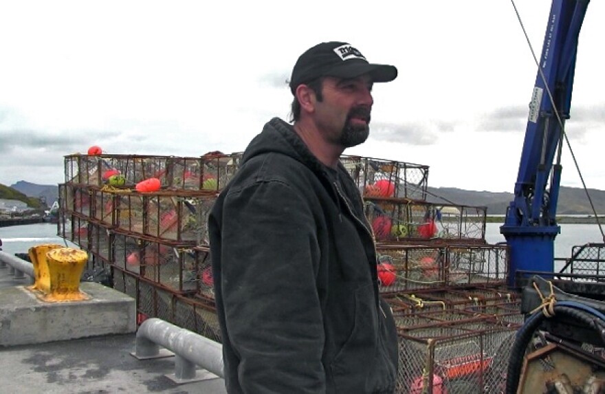 Captain Moore Dye of the F/V Western Mariner gears up for crab season this week in Dutch Harbor. (Annie Ngo/KUCB)