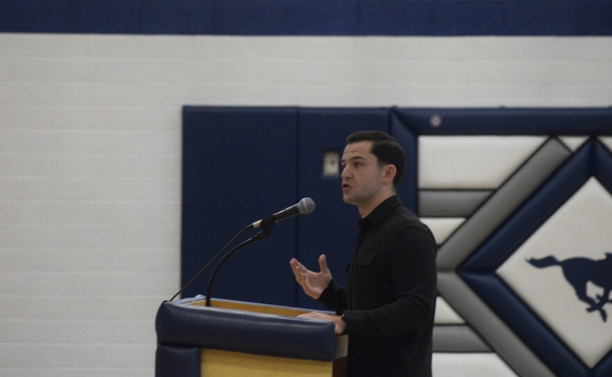 Ben Tracy spoke at the beginning of the Midday Madness event.