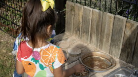 Kids play in the mud kitchen at the Pre-K 4 SA South Education Center on Monday, Oct. 26, 2026. Pre-K 4 SA has helped many community childcare providers develop their outdoor learning spaces.