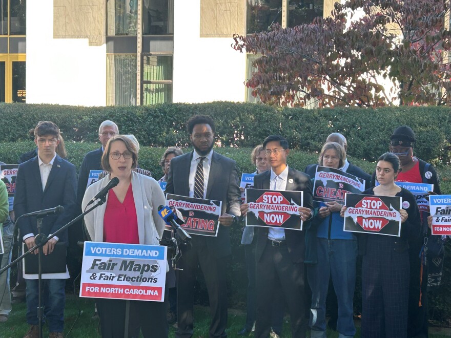 Ann Webb, Policy Director for Common Cause North Carolina, a government watchdog group, backed by voting rights advocates, addressed reporters in front of the North Carolina General Assembly, in Raleigh, on Wednesday, Oct. 25, 2023. The GOP-dominated legislature gave final approval to new Congressional and state legislative district maps.