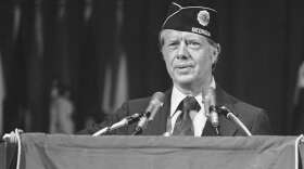 Presidential candidate Jimmy Carter speaks to members of the American Legion at their national convention in Seattle on Aug. 24, 1976. Carter called for a blanket pardon for Vietnam draft resisters, and later pardoned them as president in 1977. (AP Photo)