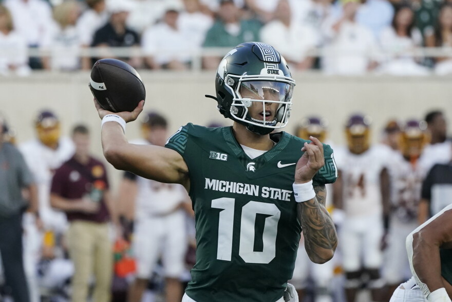 Michigan State quarterback Noah Kim passes during the first half of an NCAA college football game against the Central Michigan, Friday, Sept. 1, 2023, in East Lansing, Mich.