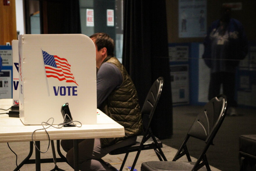 A person votes at the World War I Museum and Memorial on April 8, 2025