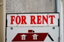 a sign reads "for rent"