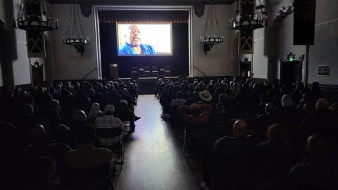 A large crowd watches the premier of 'Epicenter.'
