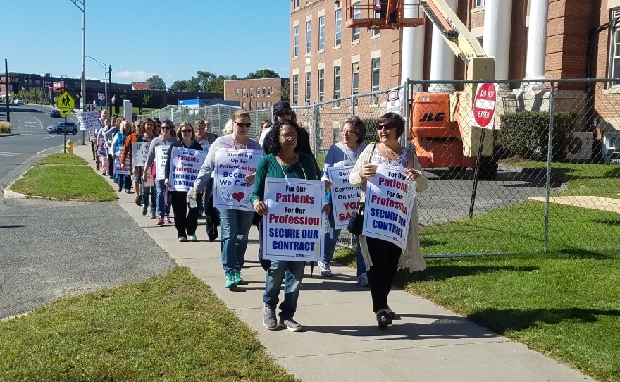 Nurses walk the picket line outside Berkshire Medical Center in Pittsfield, Mass., on Oct. 3, 2017. 