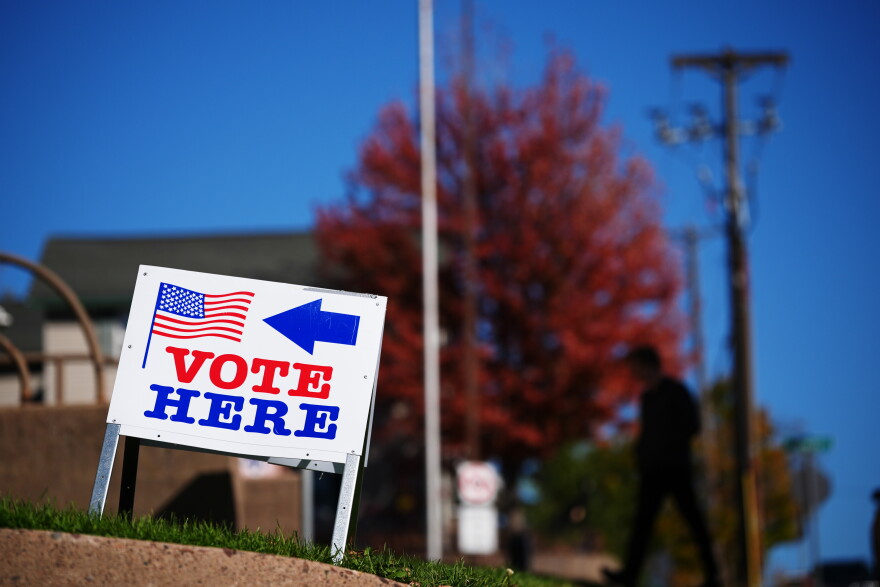A sign invites voters to cast their ballots on Wisconsin's first day of early voting, Tuesday, Oct. 20, 2026, in Eau Claire, Wis.