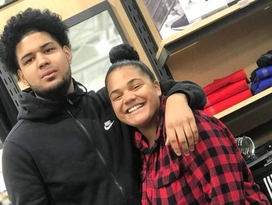 Miguel Estrella, left, with friend Carissa Nichole in 2018.