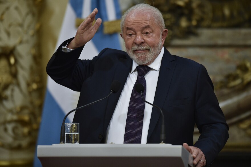 Brazilian President Luiz Inacio Lula da Silva speaks at the government house in Buenos Aires, Argentina, as he gives a joint statement with Argentina's President Alberto Fernandez, Monday, Jan. 23, 2023. (AP Photo/Gustavo Garello)