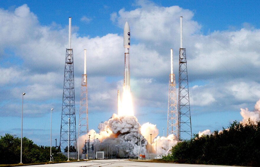 An Atlas V rocket leaves Cape Canaveral carrying New Horizons Jan. 19, 2006