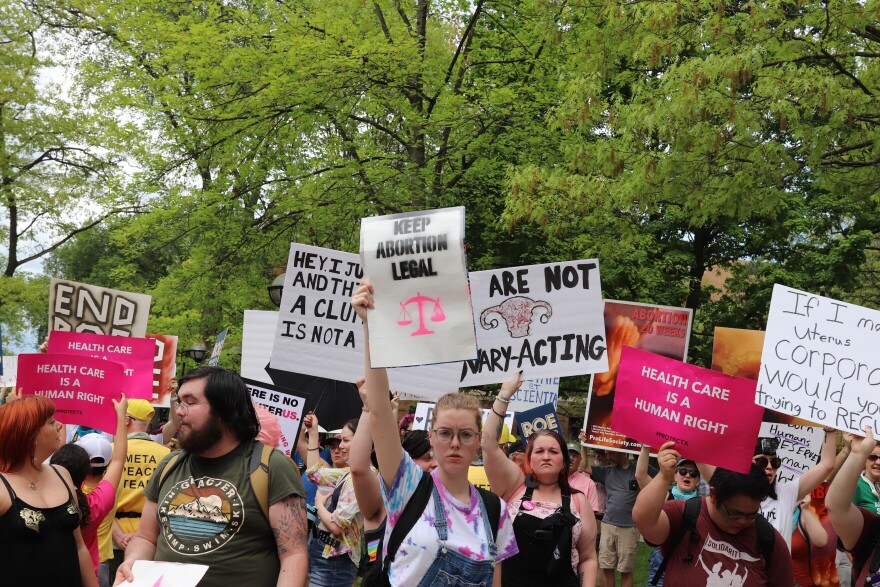 Abortion supporters and opponents rally in Ann Arbor.