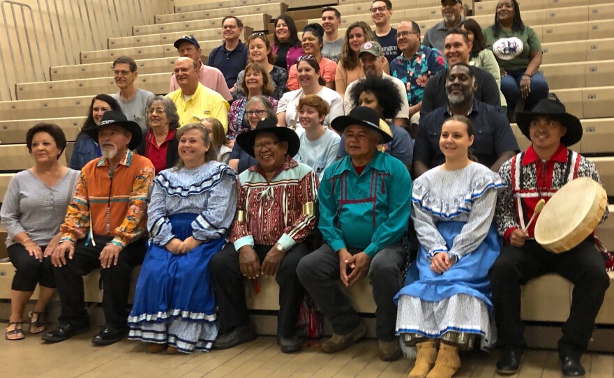 After performing at Cahokia Mounds, members of the Chickasaw Nation Dance Troupe pose with descendants of the Chickasaw tribe who live in the St. Louis area.