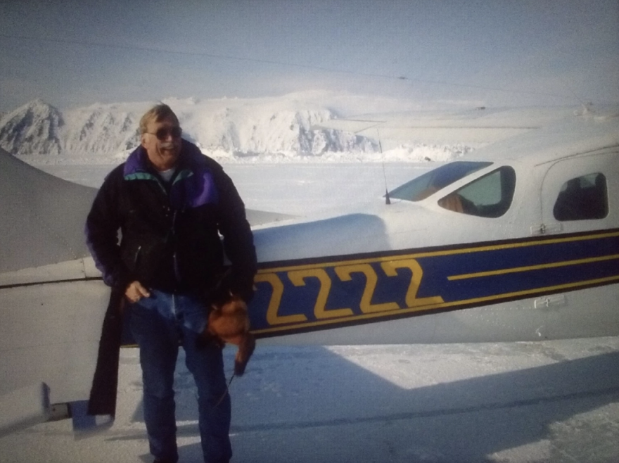 Ken Jouppi stands next to the Cessna 206 that the state of Alaska later seized after he was convicted on a bootlegging charge for ignoring beer loaded onto a flight en route to the dry village of Beaver in 2012.