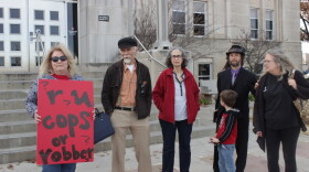 Supporters of Norman City Councilman Stephen Holman stand outside the Cleveland County Courthouse Dec. 11 during Holman's arraignment