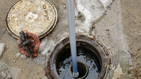 Testing for water at a Butler County gas station.