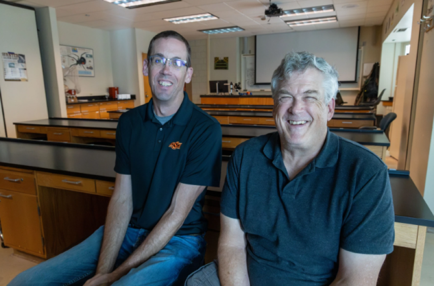 Oklahoma State University Professors Scott Loss (left) and Bruce Noden (right) have linked the lone star tick to Oklahoma's invasive red cedar tree population. The two researchers first bonded over their shared interest in ticks.
