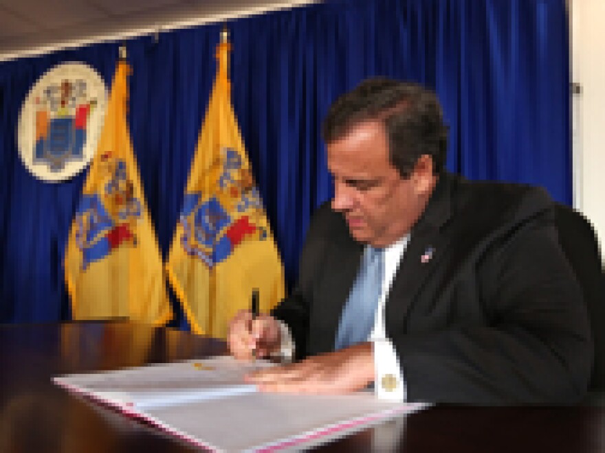 Christie signs the law