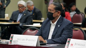 Sandia Pueblo Gov. Stuart Paisano asks congressional candidates how they would protect tribal water rights during a political forum hosted by the All Pueblo Council of Governors in Albuquerque, N.M., on Friday, Oct. 14, 2022. (AP Photo/Susan Montoya Bryan)