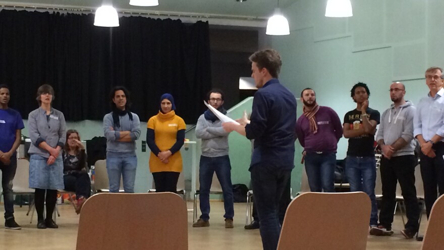 Members of Berlin's recently formed <em>Begegnungschor </em>Choir (Getting To Know You Choir) rehearse. The 50-person choir is made up equally of Germans and asylum seekers, who are from Syria and Eritrea.