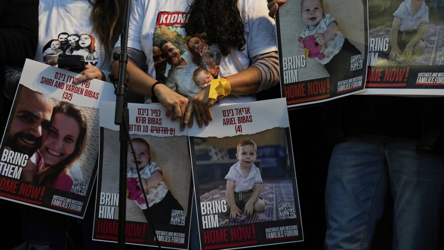 Israeli protesters call for the release of the Bibas family, whose members are being held hostage in the Gaza Strip by the Hamas militant group, in Tel Aviv, Israel, on Tuesday.