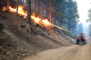   A firefighter uses what's known as a Terra Torch on a 2022 prescribed fire in northwestern Utah.