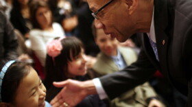 Deputy mayor for education Dennis Walcott speaks with school children after being introduced by New York Mayor Michael Bloomberg as New York City's new Schools Chancellor following the departure of the controversial Cathleen Black on April 7 in New York City.