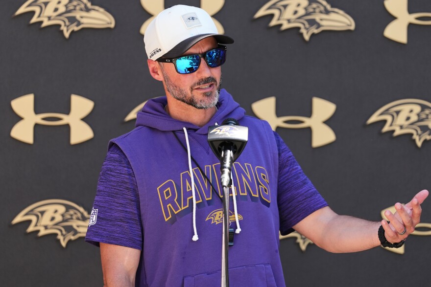 Baltimore Ravens head coach Jesse Minter speaks during a press conference after the NFL football team's practice, Tuesday, May 19, 2026, at the Under Armour Performance Center in Owings Mills, Md. (AP Photo/Stephanie Scarbrough)