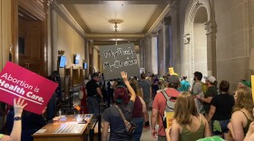 Abortion rights supporters gather in the Indiana Statehouse as the Indiana Senate debates legislation that would ban most abortion in the state.