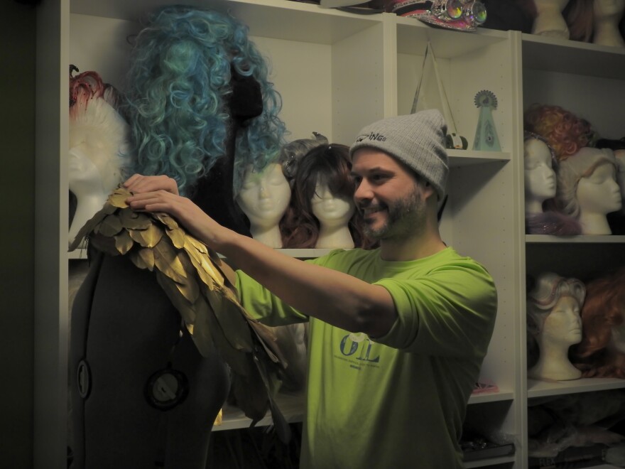 Patrick Dunn prepares a new costume for his drag-based performance work as Kiki Lucia. New Haven, Conn.