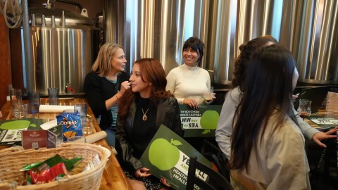Members of a watch party at Renegade Brewing in Denver celebrate Proposition MM and LL passing on Tuesday, Nov. 4, 2025.