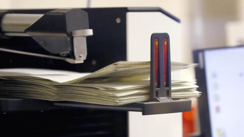 Votes are counted at the Maricopa County Recorder's Office for the Arizona primary election Tuesday, Aug. 4, 2020, in Phoenix. (Ross D. Franklin/AP)