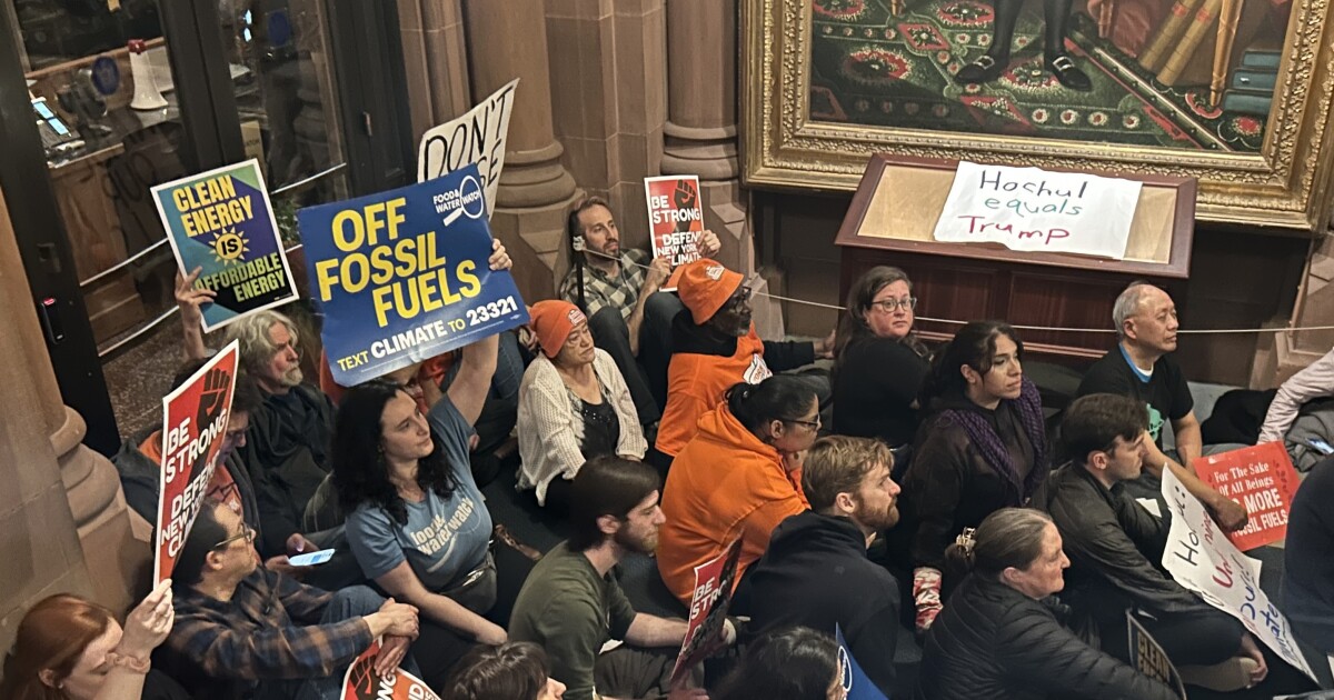 Protesters outside New York Gov. Kathy Hochul's office on March 25, 2026, in Albany urged her to back off her push to rollback regulations in the state's climate law.