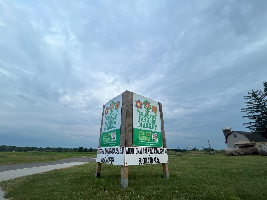 A new Brighton community center could locate near the town's winter farmers market (right) off Westfall Road.