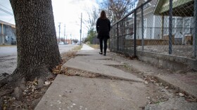 A tree root causes uneven sidewalks in Oak Cliff, near the nonprofit Better Blocks, which works to address sidewalk accessibility in Dallas.
