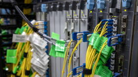 Cables connect to servers at Equinix’s data center in Billerica, Mass.  (Robin Lubbock/WBUR)