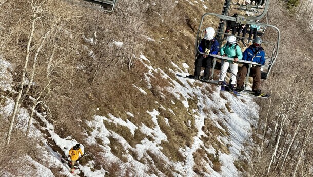 A skier hikes down the Crescent Mine Grade mountain bike trail at Park City Mountain, Feb. 8, 2026.