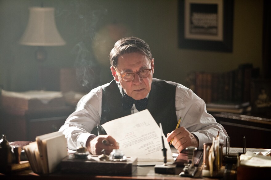 A heavily made-up Harrison Ford plays Brooklyn Dodgers manager Branch Rickey in <em>42</em>. The real-life Rickey helped convince a wary Robinson that the time was right for a racially integrated major league.