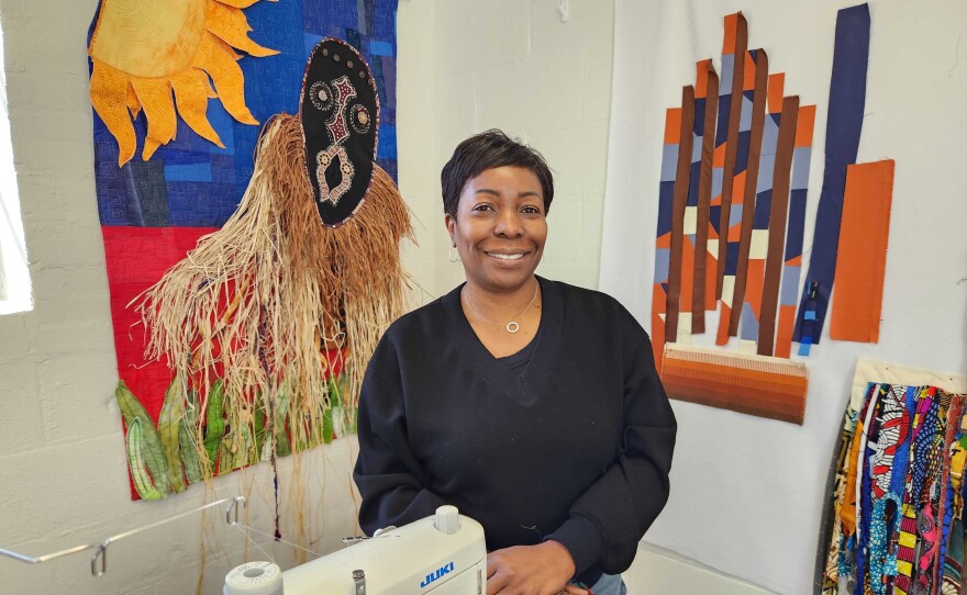 Artist Lisa Moore creates quilts reflective of Black history and culture in her studio at the Art and History Museums Maitland.