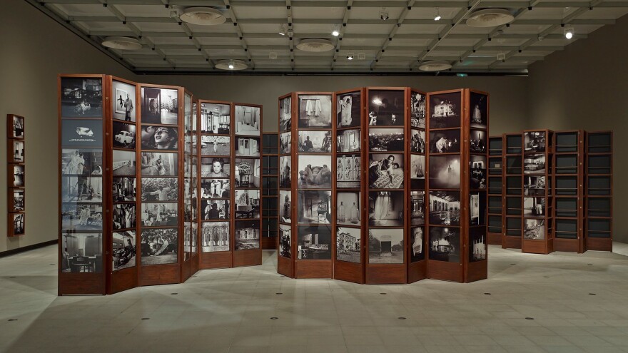 Singh's <em>Museum of Chance</em> consists of photographs inside a series of large cabinet-like structures. (Shown here on display at London's Hayward Gallery.)