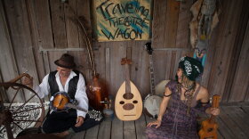  Shira Lee, right, sits on the Babawagon, a traveling stage that is bringing art outside of the box.  