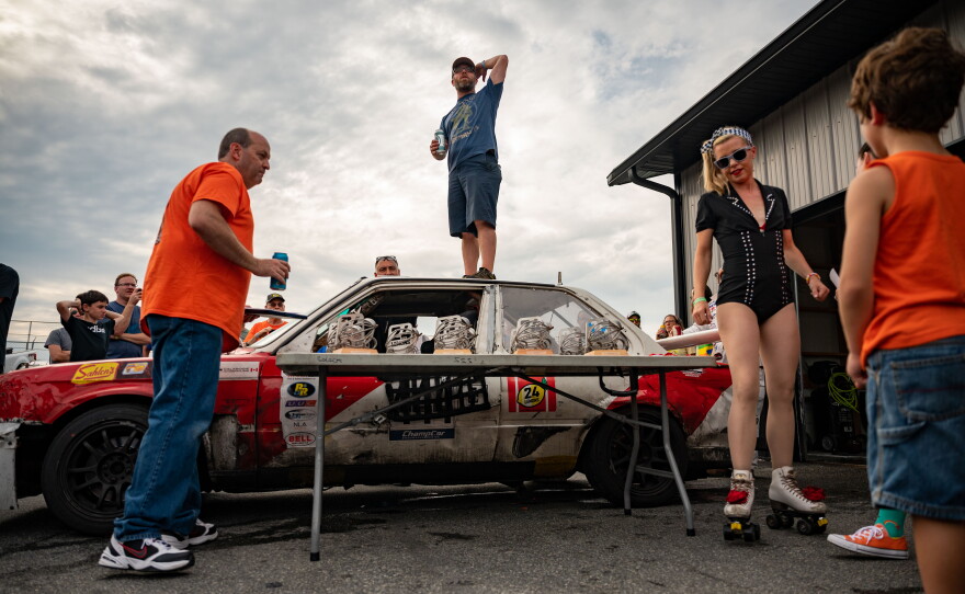 Clunkers-turned-race cars had their day to shine when Thompson Speedway Motorsports Park played host to 24 Hours of Lemons, an endurance race for cars made with less than $500. At the end of the race, Class A winners have the honor of their car being used as the judges’ stage for handing out awards. The trophies arrayed before it are for race winners as well as more unique commendations. The “Heroic Fix” and “I Got Screwed” awards are long-standing traditions.