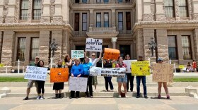 Adoptees protest in front of the state Capitol in support of unsealing original birth certificates in May 2021.