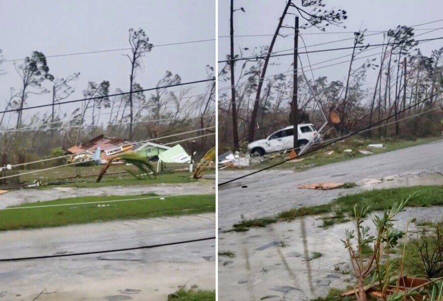 Uprooted trees, fallen power lines and the debris from damaged houses scatter on a road as Hurricane Dorian sweeps through Marsh Harbour, Bahamas.