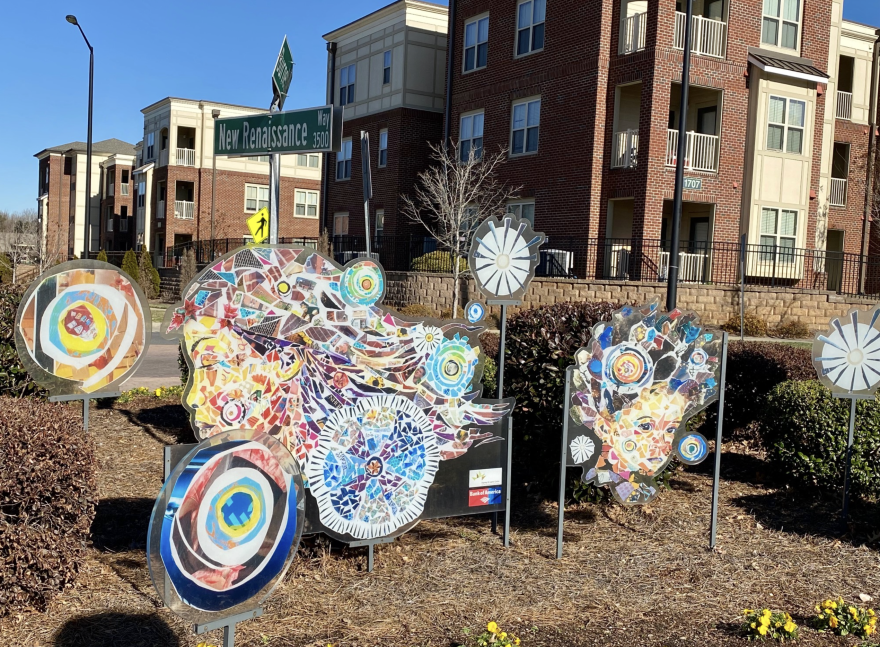 A collage titled "Welcoming Dreams" greets people at the entrance to the Renaissance West community.