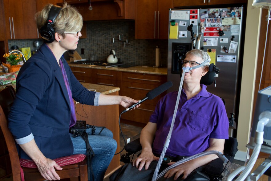 Morning Edition host Cathy Wurzer (left) interviews Bruce Kramer on Sept. 4, 2014, at Kramer's home in Hopkins, Minnesota.